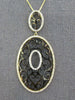 LARGE .60CT DIAMOND & BLACK ENAMEL 14KT YELLOW GOLD DOUBLE OVAL FILIGREE PENDANT