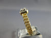 .22CT DIAMOND 14KT YELLOW GOLD ROUND & BAGUETTE INVISIBLE SQUARE LOVE KNOT RING