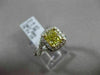 ESTATE 1.82CTW GIA FANCY YELLOW DIAMOND 18KT WHITE GOLD HALO ENGAGEMENT RING