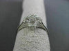ANTIQUE SMALL .16CT DIAMOND 14KT WHITE GOLD FLORAL FOUR PETAL PAVE CLUSTER RING