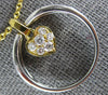 ESTATE .23CT DIAMOND 18KT WHITE & YELLOW GOLD CIRCLE OF LIFE HEART LOVE PENDANT