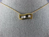 ESTATE .17CT DIAMOND 18KT WHITE & ROSE GOLD 3 STONE ETOILE FLOATING LOVE PENDANT