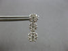 1.0CT DIAMOND 14KT WHITE GOLD 3D MULTI FLOWER JOURNEY SCREWBACK HANGING EARRINGS
