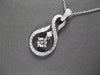 ESTATE .25CT DIAMOND 18KT WHITE GOLD SOLITAIRE INFINITY FLOATING PENDANT & CHAIN