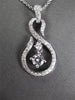 ESTATE .25CT DIAMOND 18KT WHITE GOLD SOLITAIRE INFINITY FLOATING PENDANT & CHAIN