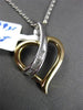 ESTATE .20CT BAGUETTE DIAMOND 14K WHITE & YELLOW GOLD FLOATING HEART PENDANT