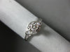 ESTATE .54CT ROUND & BAGUETTE DIAMOND 18K WHITE GOLD 3D INFINITY ENGAGEMENT RING