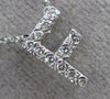 ESTATE .20CT DIAMOND 14KT WHITE GOLD 3D " F " INITIAL FLOATING PENDANT #19410