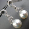 ESTATE .23CT DIAMOND & AAA SOUTH SEA PEARL 18KT WHITE GOLD BOW HANGING EARRINGS