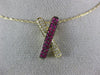 ESTATE .42CT DIAMOND & AAA RUBY 14KT YELLOW GOLD CLASSIC X LOVE FLOATING PENDANT