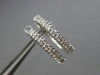 ESTATE .29CT ROUND DIAMOND 14KT WHITE GOLD 3D CLASSIC OVAL LOVE HUGGIE EARRINGS