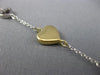 ESTATE LONG TIFFANY & CO. 18K WHITE & YELLOW GOLD FLOATING HEART BRACELET #23095
