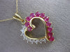 ESTATE 1.65CT DIAMOND & RUBY 14KT TWO TONE GOLD OPEN HEART LOVE FLOATING PENDANT