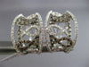 WIDE 1.20CT WHITE & CHOCOLATE FANCY DIAMOND 14KT WHITE GOLD 3D INFINITY EARRINGS