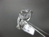 ESTATE .38CT DIAMOND 14KT WHITE GOLD HALO INFINITY SEMI MOUNT ENGAGEMENT RING
