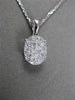 ESTATE .40CT DIAMOND 18KT WHITE GOLD FLOATING CLUSTER FILIGREE OVAL PENDANT