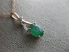 ESTATE .86CT DIAMOND & AAA EMERALD 14KT ROSE GOLD 3D CLASSIC LOVE KNOT PENDANT