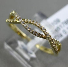 ESTATE .12CT DIAMOND 18KT YELLOW GOLD 3D DOUBLE ROW INFINITY WAVE LOVE RING