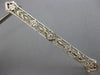 ANTIQUE .03CT OLD MINE DIAMOND 14K TWO TONE GOLD OPEN FILIGREE FLOWER PIN BROOCH