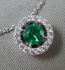 ESTATE .41CT DIAMOND & EMERALD 18KT WHITE GOLD CLASSIC HALO FLOATING PENDANT E/F