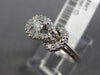 ESTATE .25CT DIAMOND 14KT WHITE GOLD 3D FILIGREE LOVE KNOT BELT SOLITAIRE RING