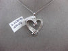 ESTATE .29CT ROUND & BAGUETTE DIAMOND 14K WHITE GOLD FLOATING LOVE HEART PENDANT