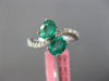 ESTATE 1.43CT DIAMOND & COLOMBIAN EMERALD 18KT WHITE GOLD DOUBLE OVAL WAVE RING