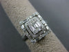WIDE .88CT ROUND & ASSCHER BAGUETTE DIAMOND 18KT WHITE GOLD HALO ENGAGEMENT RING