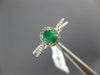 ESTATE .54CT DIAMOND & AAA EMERALD 14KT WHITE GOLD 3D OVAL HALO FRIENDSHIP RING