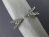 ESTATE .15CT DIAMOND 18KT WHITE GOLD 3D CLASSIC TRIANGULAR TENSION FUN LOVE RING