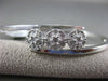 ESTATE .10CT DIAMOND 14KT WHITE GOLD THREE STONE FLOWER CLUSTER BANGLE BRACELET