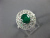 ESTATE 1.95CT DIAMOND & AAA EMERALD 18KT WHITE GOLD FLOWER OVAL ENGAGEMENT RING