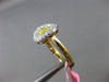 ESTATE WIDE .58CT WHITE & YELLOW DIAMOND 18KT TWO TONE GOLD CIRCULAR HEART RING