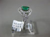 ESTATE WIDE .81CT DIAMOND & AAA EMERALD 14KT WHITE GOLD INFINITY ENGAGEMENT RING