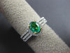 ESTATE .82CT DIAMOND & AAA OVAL CUT EMERALD 18K 2 TONE GOLD HALO ENGAGEMENT RING