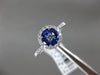 ESTATE .74CT DIAMOND & AAA SAPPHIRE 18KT WHITE GOLD CIRCULAR FLOWER PROMISE RING