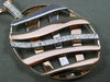 ESTATE LARGE .28CT DIAMOND 14KT WHITE & ROSE GOLD CRISS CROSS MULTI WAVE PENDANT