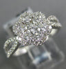 ESTATE .94CT ROUND DIAMOND 18KT WHITE GOLD 3D CLASSIC FLOWER CLUSTER LOVE RING