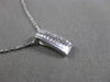 ESTATE .20CT BAGUTTE & ROUND DIAMOND 14K WHITE GOLD RECTANGULAR FLOATING PENDANT