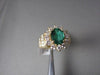 ESTATE 3.34CT DIAMOND & AAA COLOMBIAN EMERALD 14KT YELLOW GOLD FLOWER HALO RING