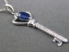 ESTATE .45CT DIAMOND & SAPPHIRE 14KT WHITE GOLD KEY TO MY HEART FLOATING PENDANT