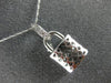 ESTATE LARGE .70CT ROUND & BAGUETTE DIAMOND 18KT WHITE GOLD 3D LOCK LOVE PENDANT