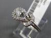 ESTATE .25CT DIAMOND 14KT WHITE GOLD 3D FILIGREE LOVE KNOT BELT SOLITAIRE RING