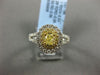 WIDE 1.36CT WHITE & FANCY YELLOW DIAMOND 18KT TWO TONE GOLD HALO ENGAGEMENT RING