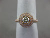 ESTATE .71CT WHITE & FANCY YELLOW DIAMOND 18KT YELLOW GOLD HALO ENGAGEMENT RING