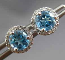 ESTATE 1.17CT DIAMOND & AAA BLUE TOPAZ 14KT WHITE GOLD ROUND HALO STUD EARRINGS