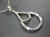 ESTATE .46CT ROUND & BAGUETTE DIAMOND 14KT WHITE GOLD TEAR DROP FLOATING PENDANT