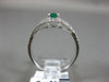 ESTATE WIDE .81CT DIAMOND & AAA EMERALD 14KT WHITE GOLD INFINITY ENGAGEMENT RING