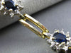 ESTATE WIDE 2.90CT DIAMOND & AAA SAPPHIRE 14KT TWO TONE GOLD OVAL HALO BRACELET