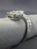 ESTATE 1.47CT ROUND & BAGUETTE DIAMOND 18KT WHITE GOLD SQUARE CRISS CROSS RING